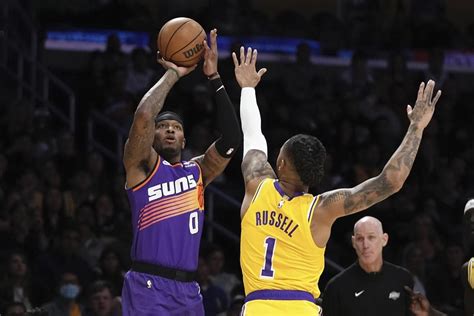 Lakers charge to skid-snapping win over Suns, 122-111
